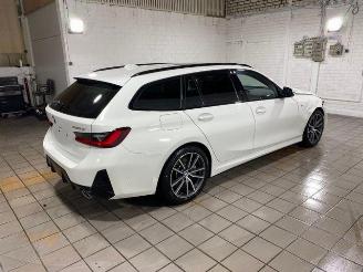 BMW 3-serie 0d xDrive Touring M Sport PANO/HUD/AHK/60 picture 2