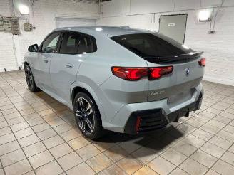 Vaurioauto  passenger cars BMW iX2 eDrive20 M Sport KAM 2025/8