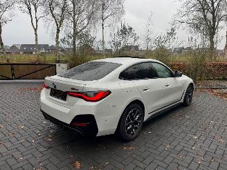 BMW i4 BMW i4 Gran Coupe M50 Panorama Laser Light HUD 360 Camera HarmanKardon Leer Ambiance VOL! picture 2