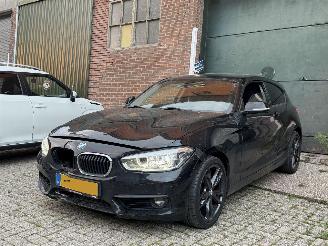 Vaurioauto  passenger cars BMW 1-serie 118i Executive automaat KM NAP 2018/2