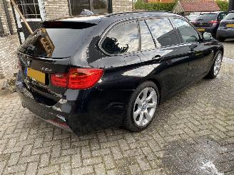 BMW 3-serie Auto is GERESERVEERD.330d xDrive High Executive Touring Pano picture 14
