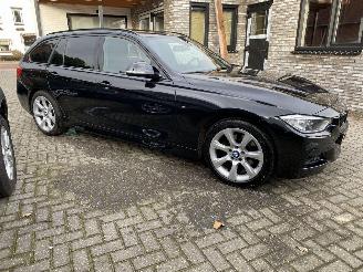 BMW 3-serie Auto is GERESERVEERD.330d xDrive High Executive Touring Pano picture 2