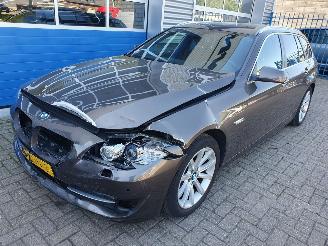 Schadeauto BMW 5-serie 520i automaat Upgrade Edition 2012/10