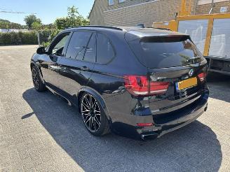 Damaged car BMW X5 xDrive40e iPerformance High Exec M-Pakket 2015/12