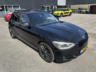 Unfallwagen BMW 1-serie 116i  5-drs  High Exe. 2013/12