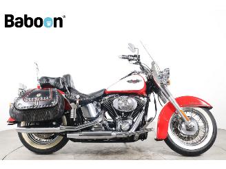 Vaurioauto  motor cycles Harley-Davidson  FLSTN Softail Deluxe 2004/11