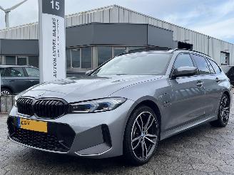 Damaged car BMW 3-serie Touring 330e xDrive 2023/2