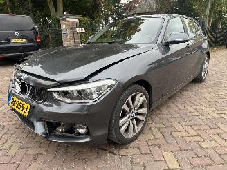 damaged passenger cars BMW 1-serie 118i Executive 2017/12