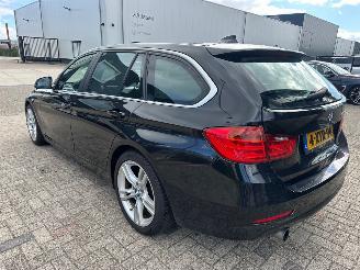 BMW 3-serie 320i Automaat Executive picture 4