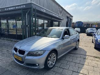 Schadeauto BMW 3-serie 318i SEDAN 105KW AIRCO 2009/1
