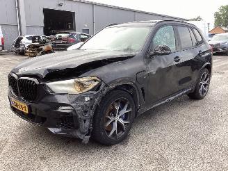 Schadeauto BMW X5 xDrive45e Executive 2021/7