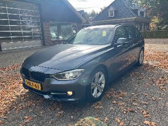Damaged car BMW 3-serie 320i Executive Sport Aut. 2013/6