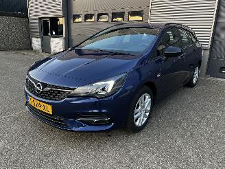 Vaurioauto  passenger cars Opel Astra Sports Tourer 1.2i NAVI / CRUISE / CAMERA / XENON 2021/7