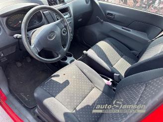 Daihatsu Cuore Cuore (L251/271/276), Hatchback, 2003 1.0 12V DVVT picture 8