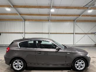 Schadeauto BMW 1-serie 118d 100kW Airco Corporate Business Line 2009/1