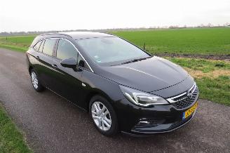 Damaged car Opel Astra SPORTS TOURER+ 1.0 77kw 105pk  Business+  Euro 6 Navigatie Clima  2016 2016/5