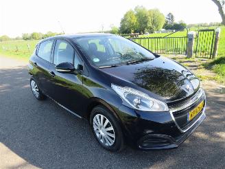 Peugeot 208 1.2 82pk  60.000km nap Pure Tech Action Navigatie Airco 2016  [ nieuwstaat picture 9