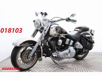 Vaurioauto  motor cycles Harley-Davidson Heritage Softail FLSTN Nostalgia nr. 1299 1993/2