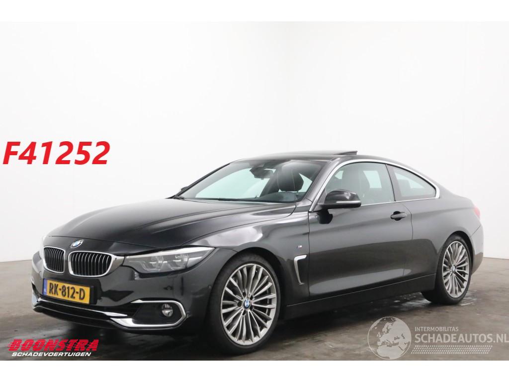 BMW 4-serie Coupé 440i M-Sport Schuifdak LED Leder H/K Memory HUD Camera AHK
