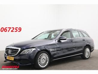 Damaged car Mercedes C-klasse Estate 180 Aut. LED ACC HUD Leder SHZ PDC 2014/11
