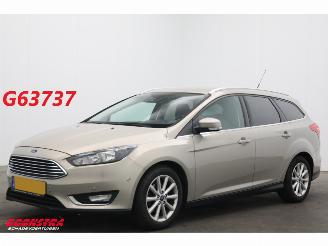 begagnad bil auto Ford Focus 1.0 Titanium Edition Cruise Navi Clima SHZ PDC AHK 2015/1