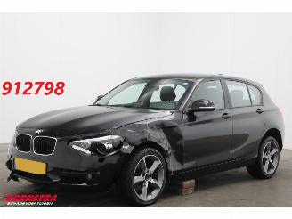 damaged passenger cars BMW 1-serie 116i Business Cruise Navi Airco SHZ PDC 2015/2