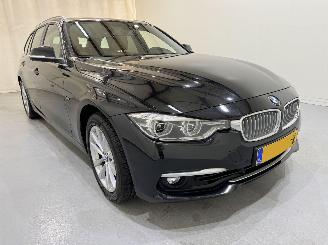 Voiture accidenté BMW 3-serie Touring 320i M sport High Exe Aut. 2018/9