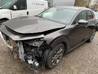 damaged passenger cars Mazda CX-30 2.0 Skyactive X Automaat Luxury 2020/7