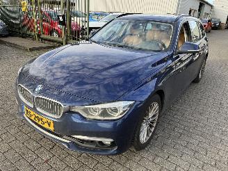 skadebil auto BMW 3-serie 320i Automaat Stationcar Luxury Edition 2019/3