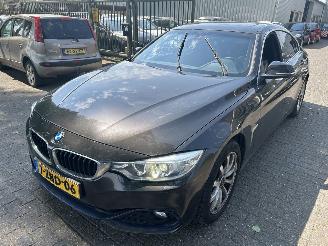 Damaged car BMW 4-serie 420i Gran Coupe High Executive 2015/1