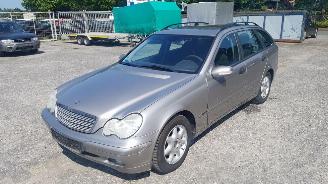 Damaged car Mercedes C-klasse W203 Zilver 723U Onderdelen deur Bumper 2003/7