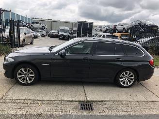 Vaurioauto  passenger cars BMW 5-serie 520i Touring Aut High Executive 2012/1