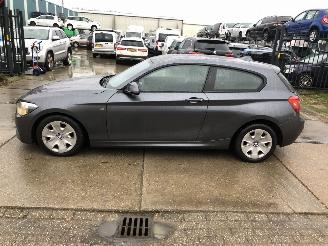 damaged passenger cars BMW 1-serie 114i 75kW E5 2012/12