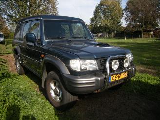Hyundai Galloper 2.5 TCI High Roof exceed uitvoering met oa airco, 4wd enz picture 11
