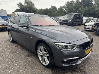 Schadeauto BMW 3-serie 318i Luxury Edition 2018/9