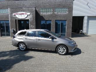 Schadeauto Toyota Auris 1.8 Hybr. Executive 2015/10