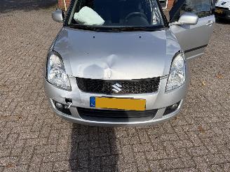 damaged passenger cars Suzuki Swift 1.5 automaat 2010/3