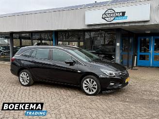 damaged passenger cars Opel Astra Sports Tourer 1.0 Edition Automaat Navigatie Clima Cruise PDC 2016/7