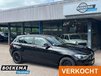 damaged passenger cars BMW 1-serie 116i High Exe Keyless Climate Cruise PDC 2014/5