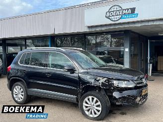 Schadeauto Volkswagen Tiguan 1.4 TSI R-Line DSG Dynaudio Stoelverwarming Climate Cruise 2014/1