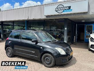 damaged passenger cars Suzuki Swift 1.3 Base Airco 3-Deurs 2009/10