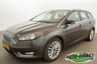 skadebil auto Ford Focus 1.0 92 kw VERBRUIKT KOELVLOEISTOF Navi Clima Titanium Edition 2015/12