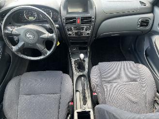 Nissan Almera Almera (N16) Hatchback 1.8 16V (QG18DE) [85kW]  (10-2002/11-2006) picture 10