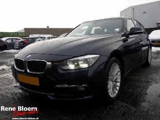 Damaged car BMW 3-serie 318i High Executive Touring Navi 2017/6