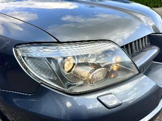Mitsubishi Outlander 2.0 Turbo 201pk 4WD - uniek - 2x schuifdak - airco - leer + alcantara + stoelverw - privacy glass - rijdbaar picture 10