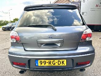 Mitsubishi Outlander 2.0 Turbo 201pk 4WD - uniek - 2x schuifdak - airco - leer + alcantara + stoelverw - privacy glass - rijdbaar picture 76