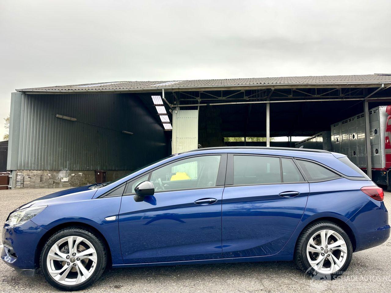 Opel Astra sports tourer 1.2T 131pk 6-bak - nap - navi - cam - bose - stoelverw v+a - stuurverw - keyless - front + line assist