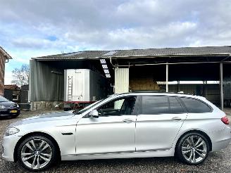 Coche accidentado BMW 5-serie Touring 520i 184pk 8-traps aut Luxury Ed - nap - leer - stoelverw - elektr trekh + stuur - memory l+r 2014/5