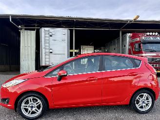 Schadeauto Ford Fiesta 1.0T EcoBoost 101pk Titanium 5drs - nap - navi - airco - aux - usb - lmv - cv afstand - elektr ram + spiegels 2013/10