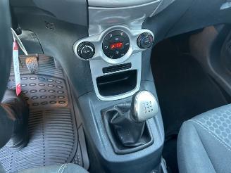 Ford Fiesta Gereserveerd 1.25i 82pk Titanium 5drs - 94dkm nap - airco - cruise - licht + regensensor + aut dimmend binnenspiegel - lmv picture 33